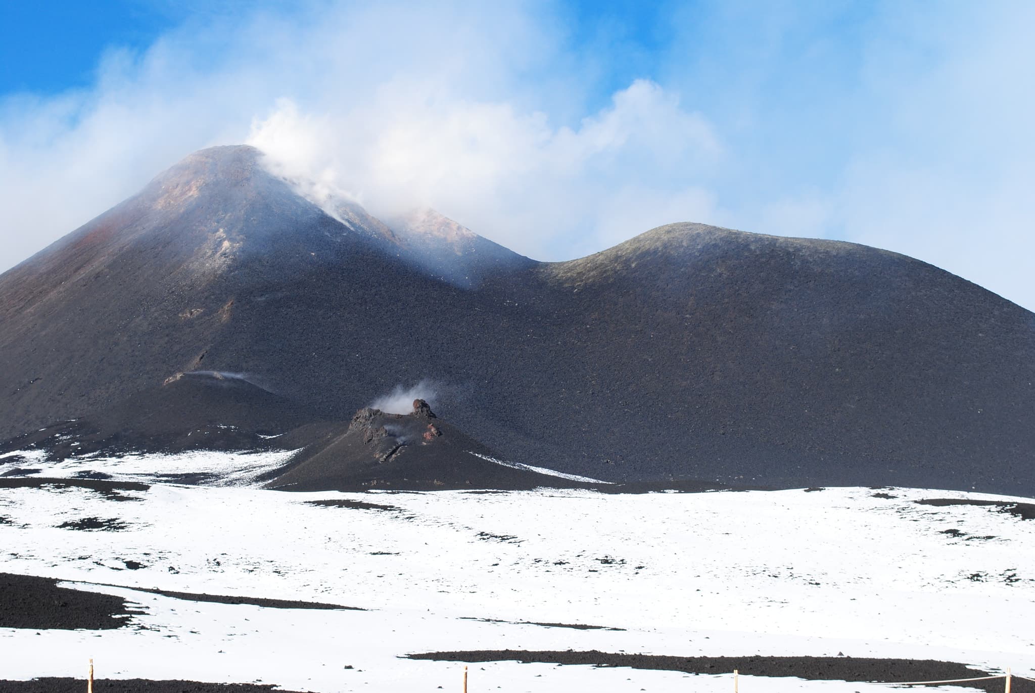 500px description: Mount Etna (Sicily), November 2011 [#sky, #landscape, #lake, #sea, #winter, #water, #cold, #nature, #travel, #volcano, #ocean, #rock, #snow, #mountain, #ice, #hill, #outdoors, #frosty, #no person]