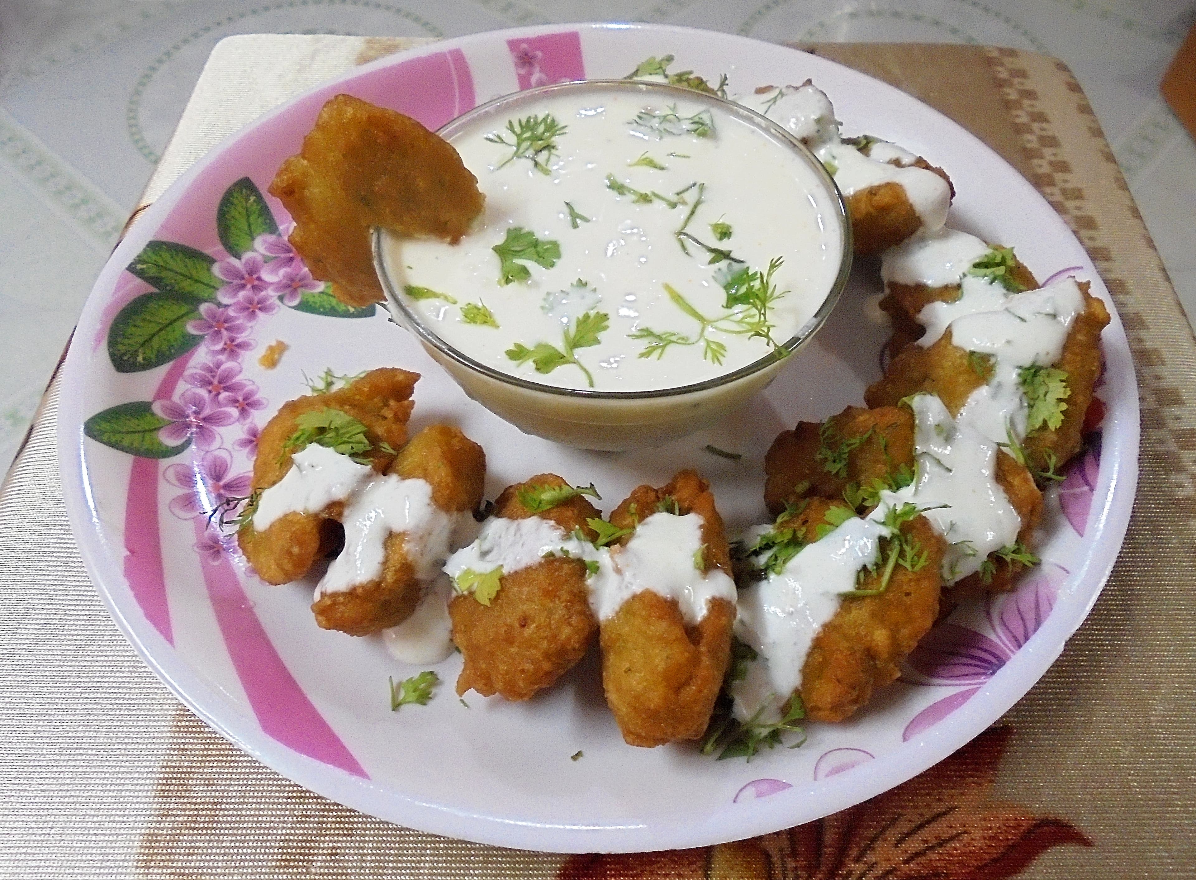This is Dahi Masala Vada, made from dal.