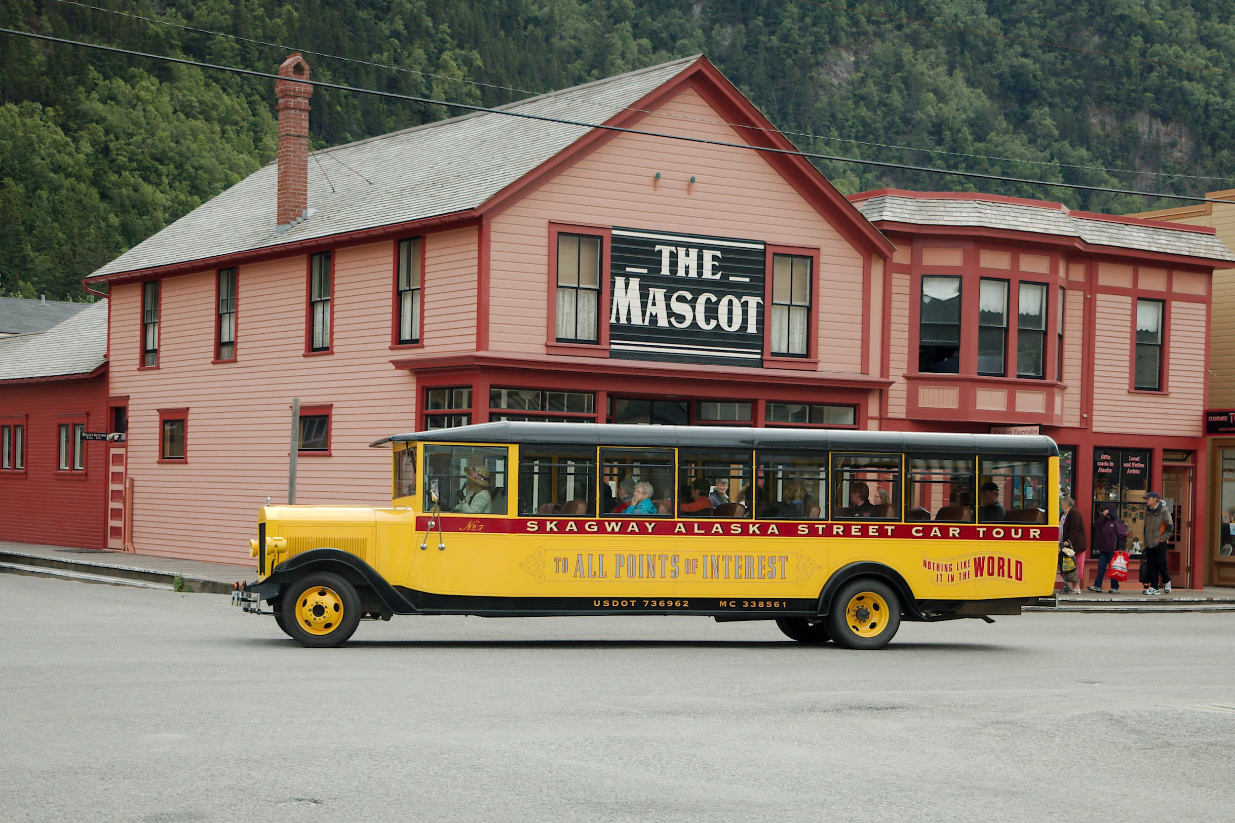Yellow sightseeing bus in Skagway, Alaska.