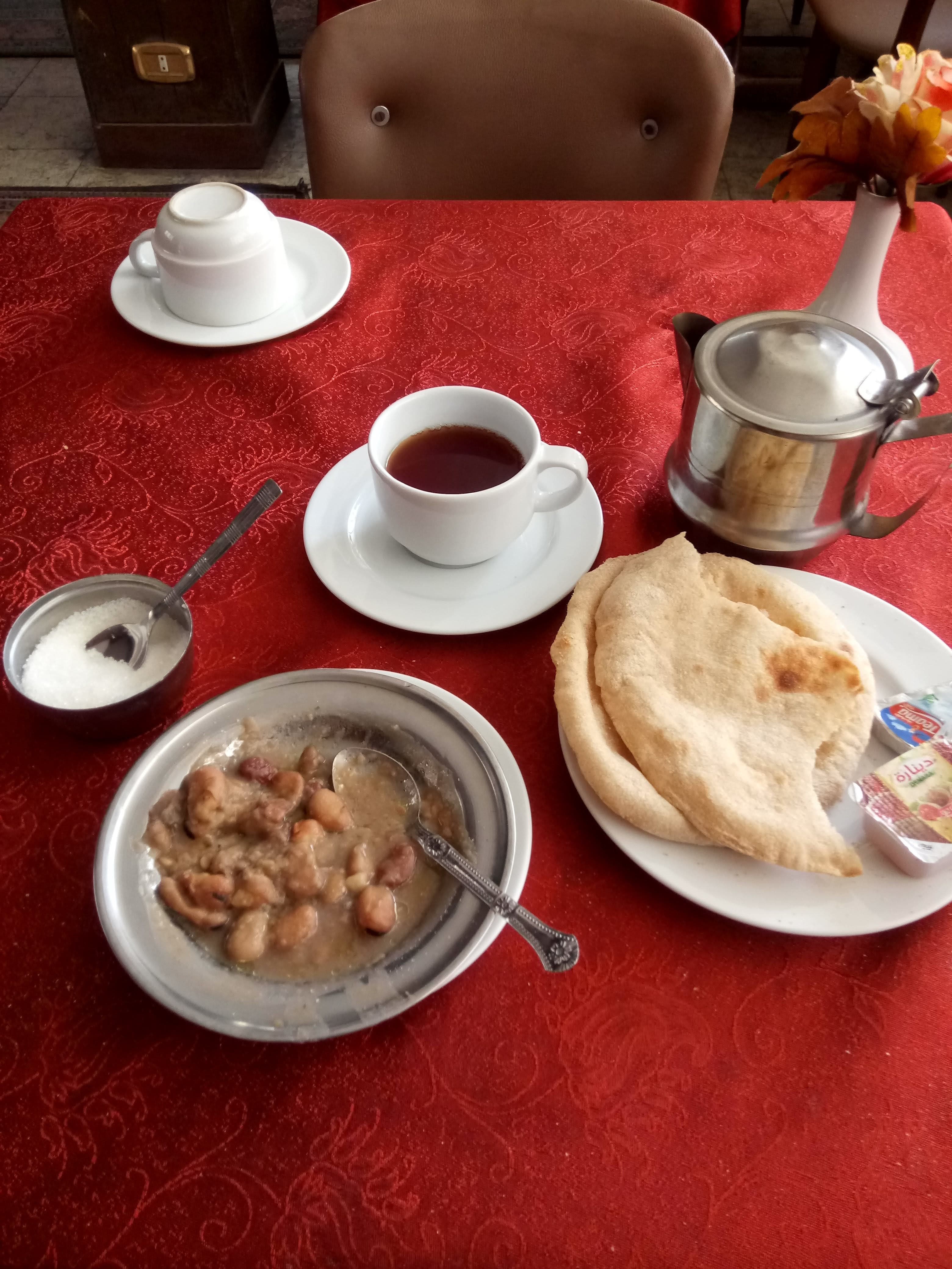 Indispensable for a breakfast table in Cairo are "ful medames," a boiled broad bean dish; "aish baladi," a local bread; and tea with plenty of sugar.