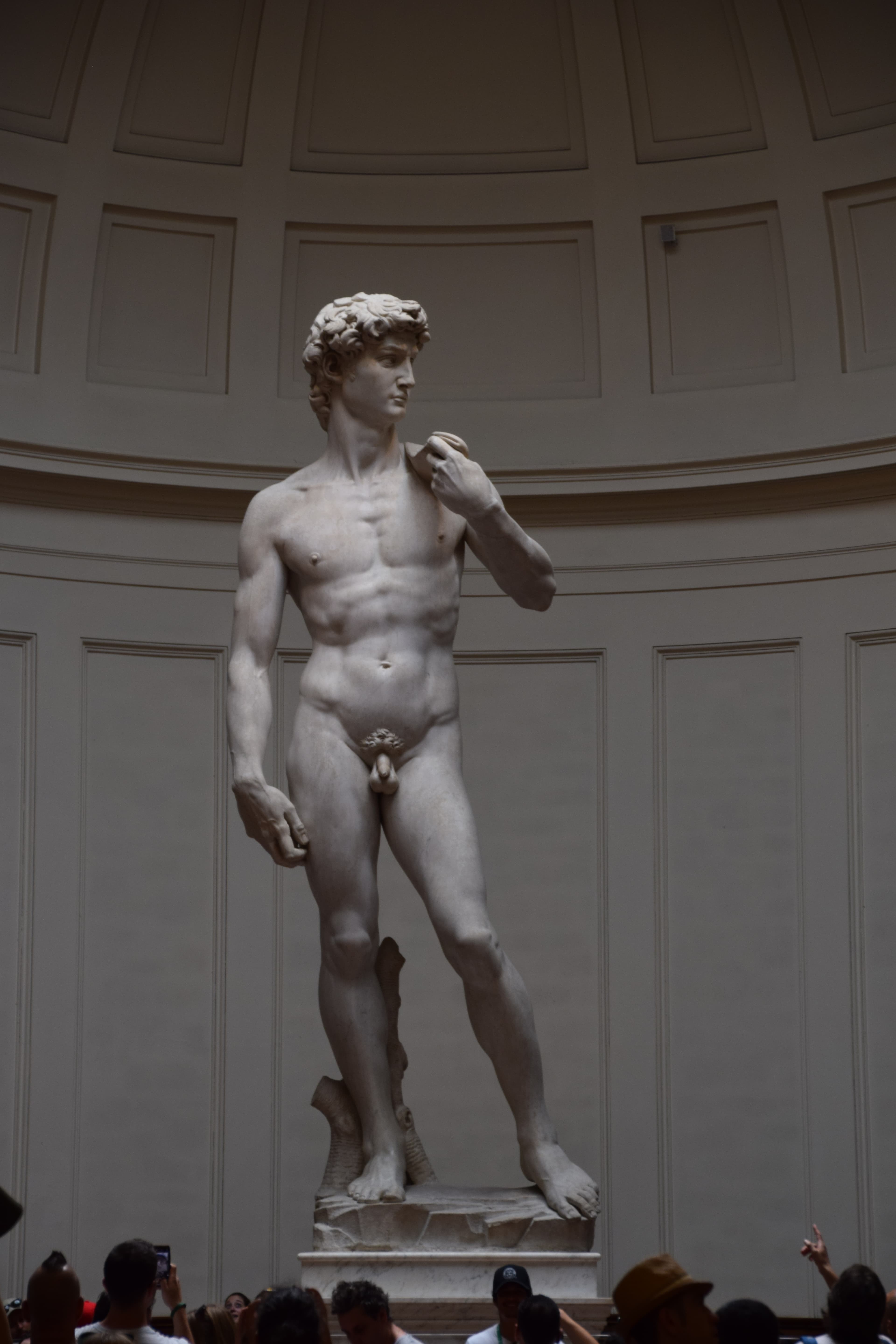 David is a masterpiece of Renaissance sculpture created in marble between 1501 and 1504 by the Italian artist Michelangelo. This 5.17-meter (17.0 ft) statue depicts the Biblical hero David, a favored subject in the art of Florence. Originally commissioned as one of a series of statues of prophets to be positioned along the roofline of the east end of Florence Cathedral, it was instead placed in a public square outside the Palazzo Vecchio, the seat of civic government in Florence, in the Piazza della Signoria, where it was unveiled on September 8, 1504. The statue was moved to the Galleria dell'Accademia in Florence in 1873, and a replica was later placed at the original location. Due to the nature of the hero it represents, the statue soon came to symbolize the defense of civil liberties embodied in the Republic of Florence, an independent city-state threatened by more powerful rival states and the hegemony of the Medici family. David's eyes, with a warning glare, were fixed towards Rome.
