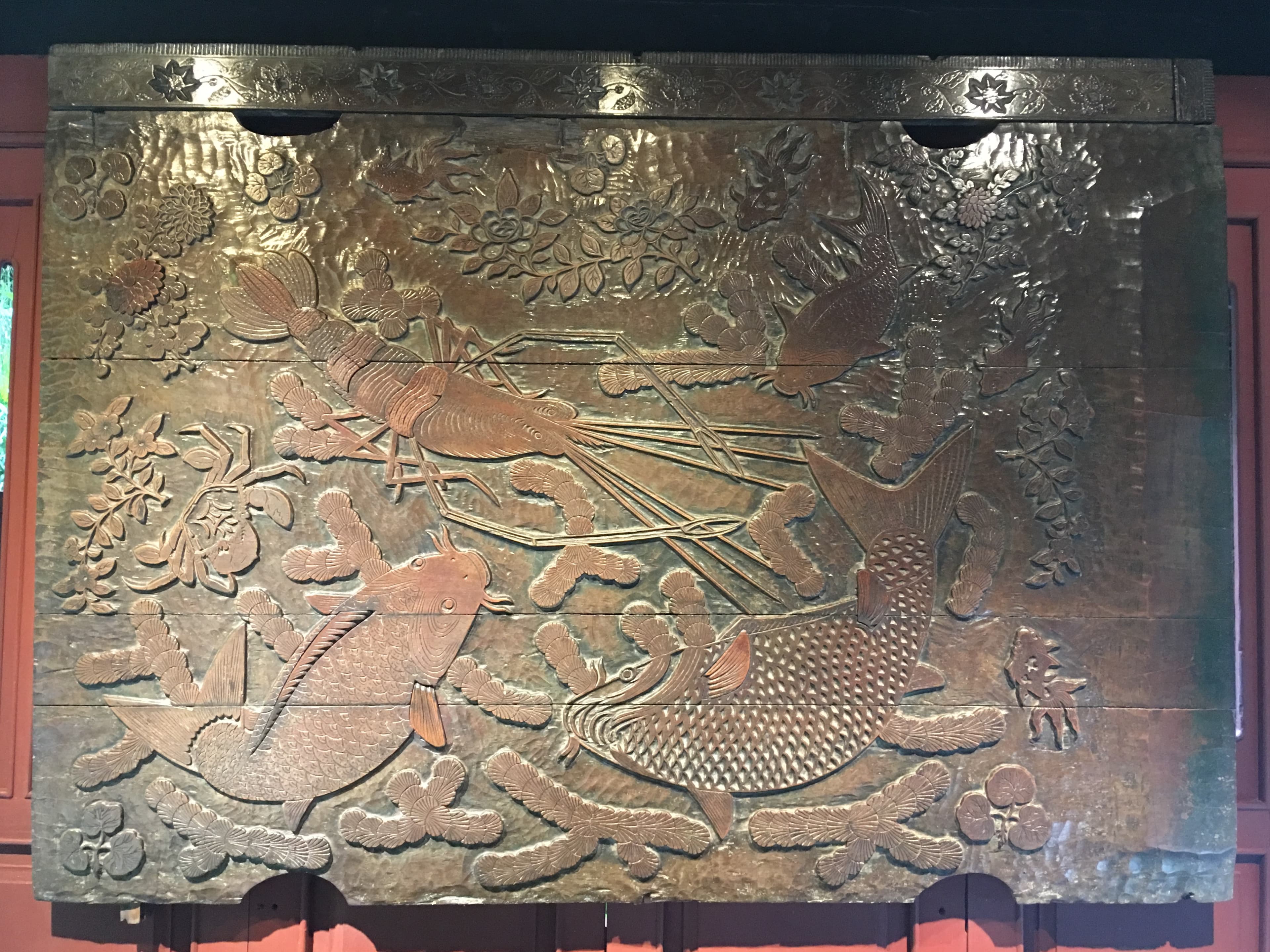 Wood-carved print frame used to print patterns on silk. Collection of the Jim Thompson House in Bangkok.