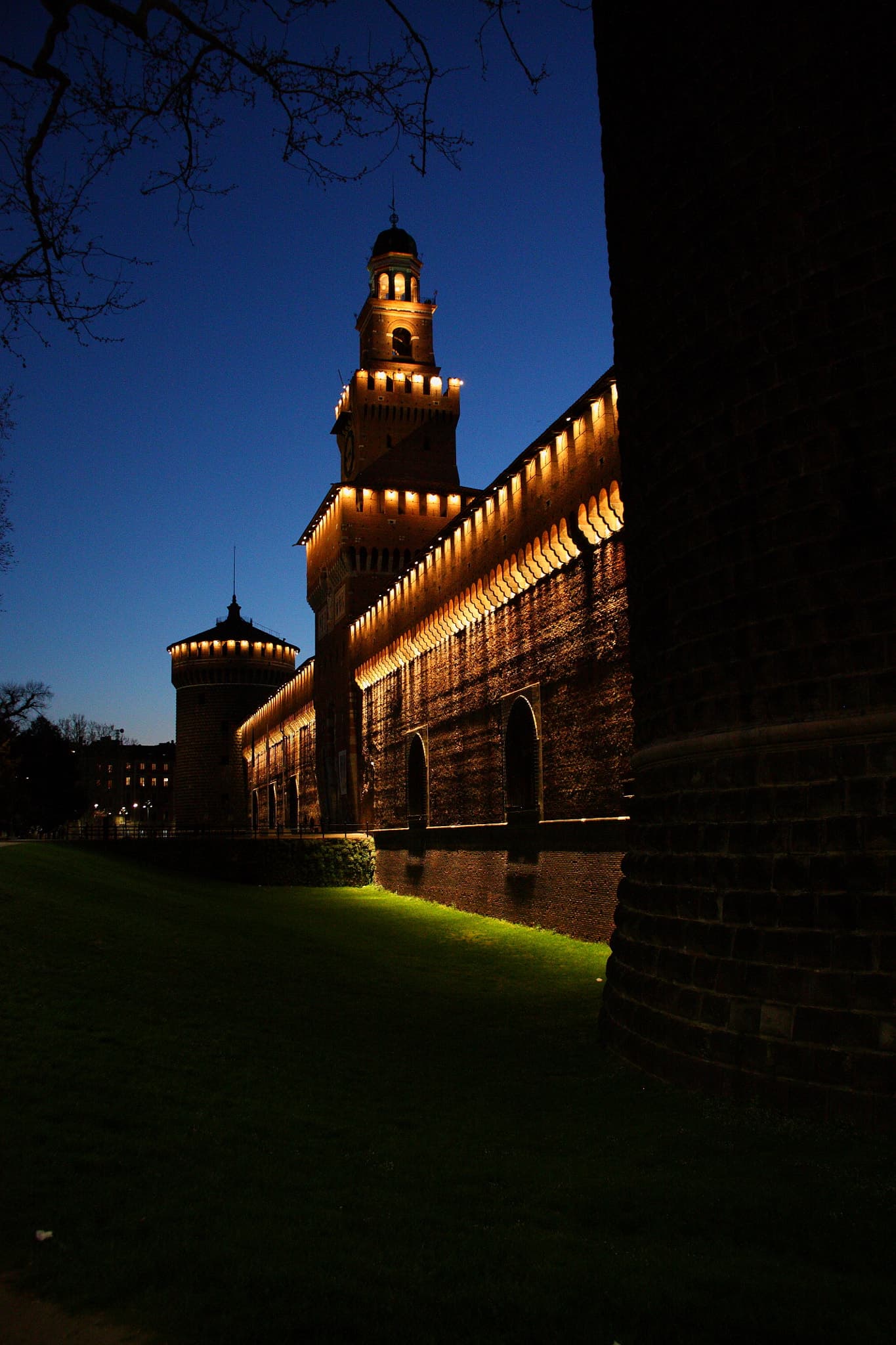 Night view of Castello Sforzesco in Milan.